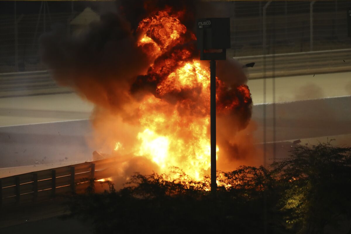 Flames seen from the crash scene after Romain Grosjean crashed out at the start of the race.