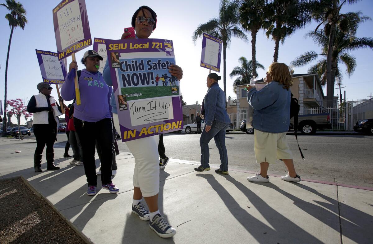Los Angeles County social workers represented by Local 721 of the Service Employees International Union went on strike Thursday demanding raises and reduced caseloads.