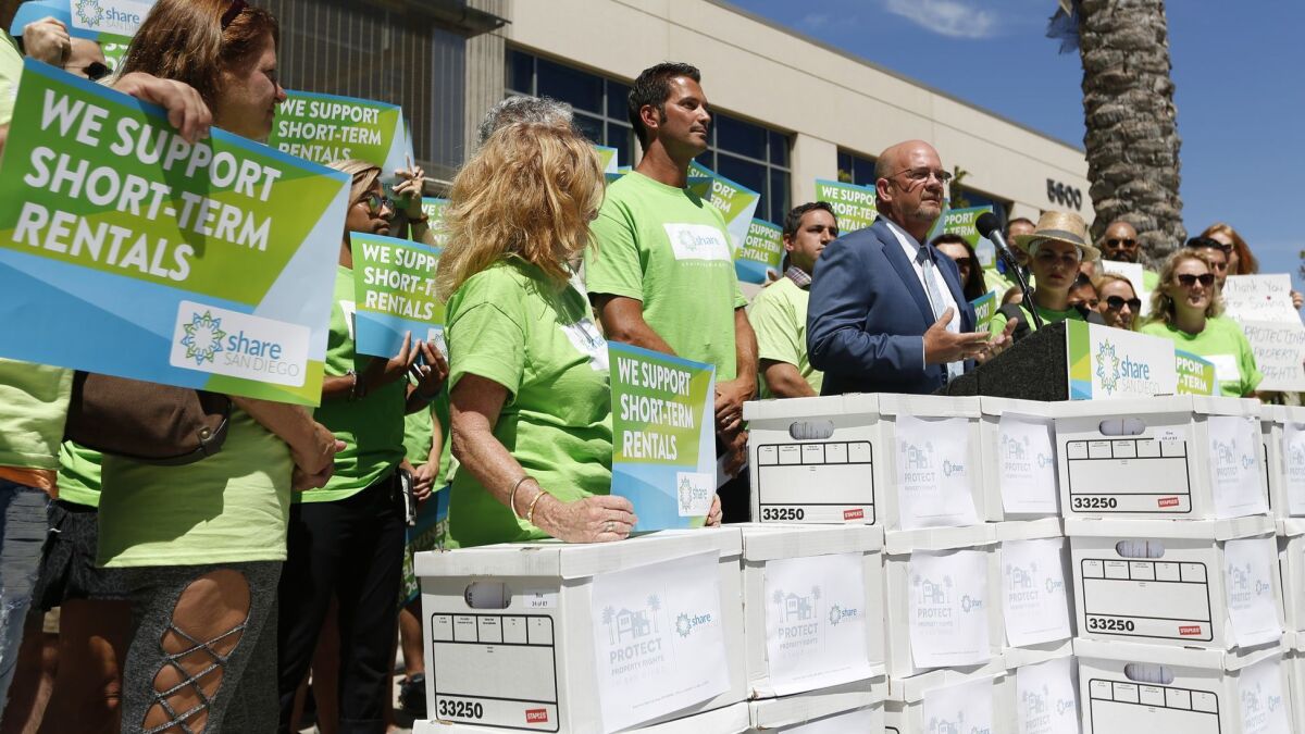 San Diego City Councilman Scott Sherman speaks at a news conference before more than 62,000 signatures were delivered to the San Diego Registrar of Voters to qualify a referendum that would overturn short-term rental regulations passed this month by the San Diego City Council.