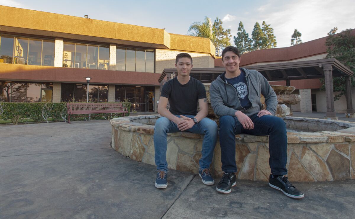 Veterans Manuel Melgoza and Brandon Lustig outside the Veterans Resource Center.