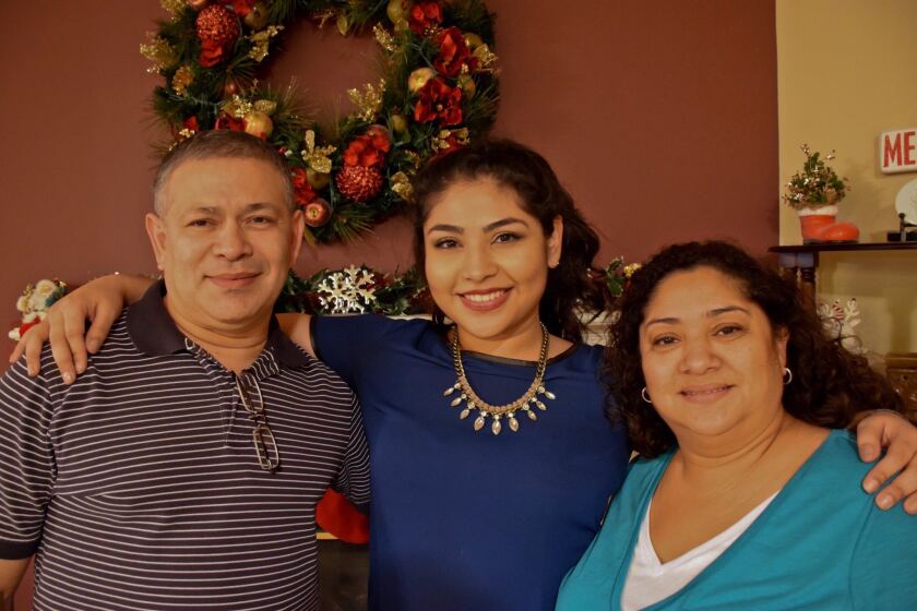 Kelly Reyes and her parents
