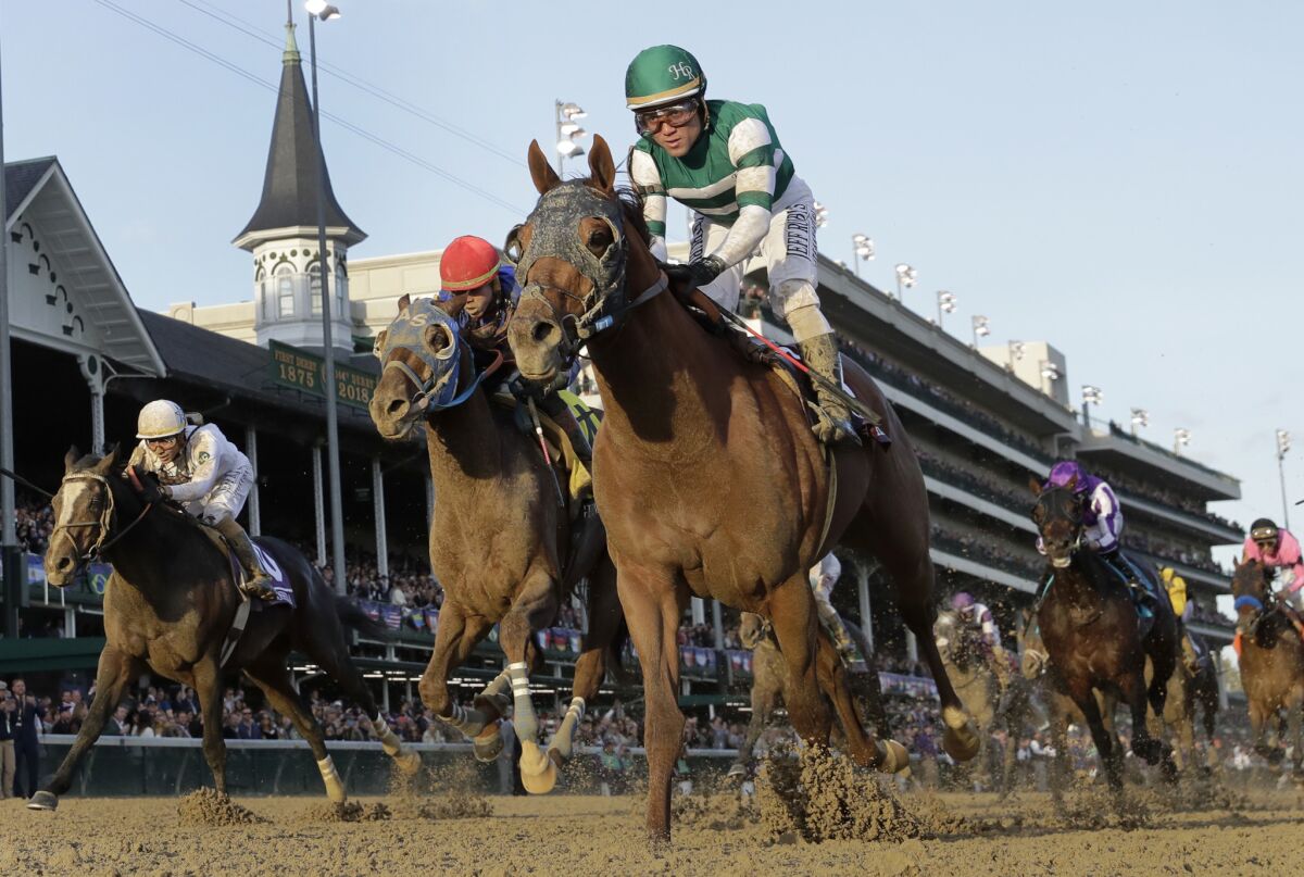 Joel Rosario rides Accelerate to victory in the Breeders' Cup Classic horse race at Churchill Downs on Nov. 3, 2018.