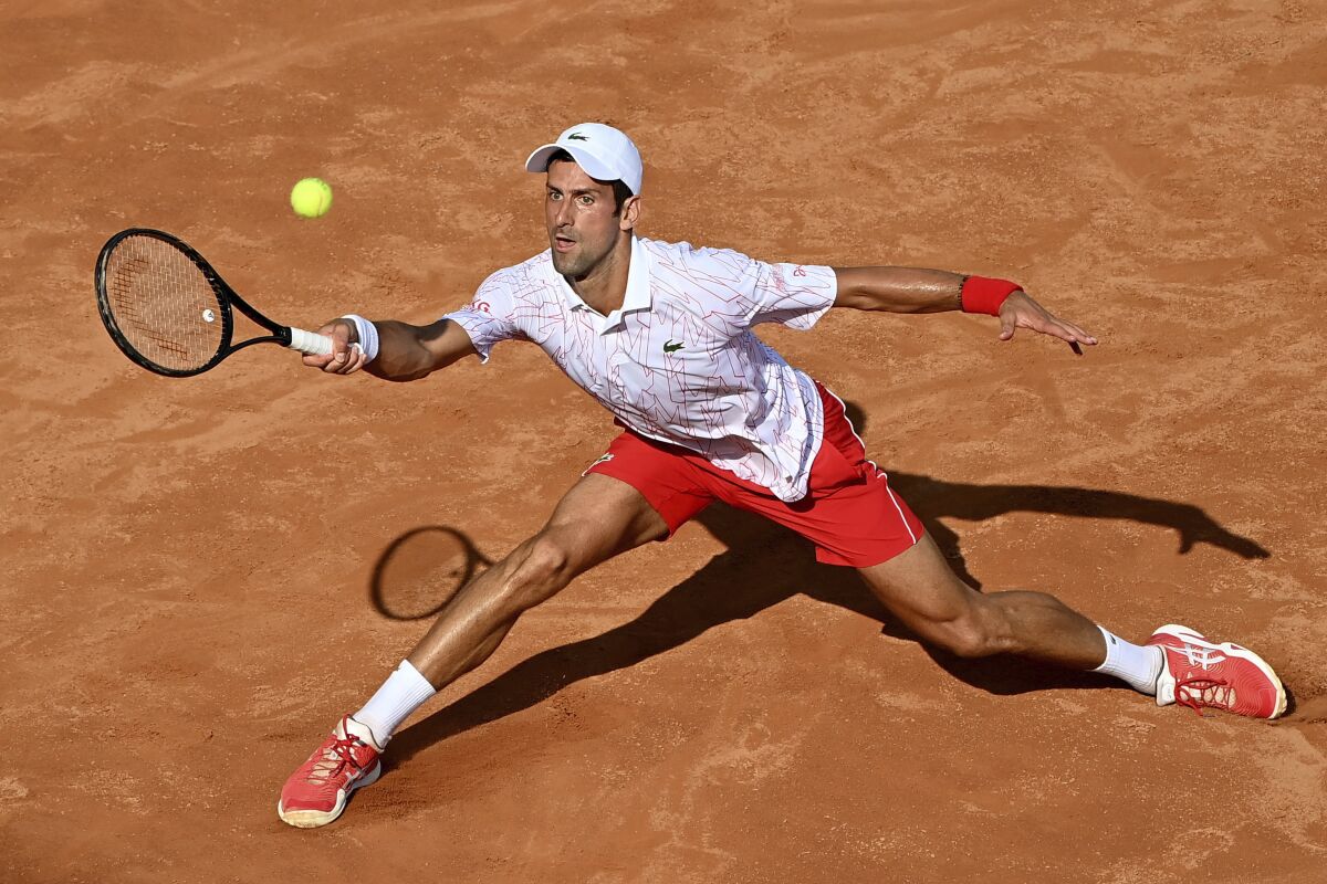 Novak Djokovic hits a return during his match against Filip Krajnovic at the Italian Open in Rome on Sept. 18.