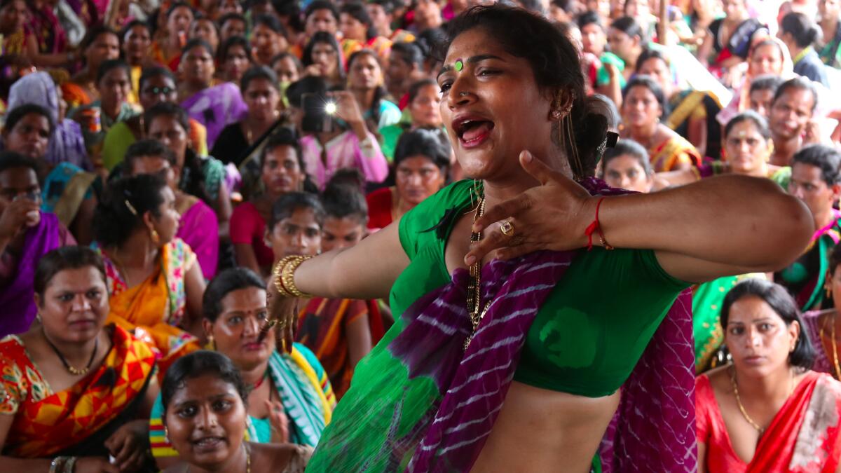 An Indian transgender woman dances during a demonstration Aug. 26 in Hyderabad.