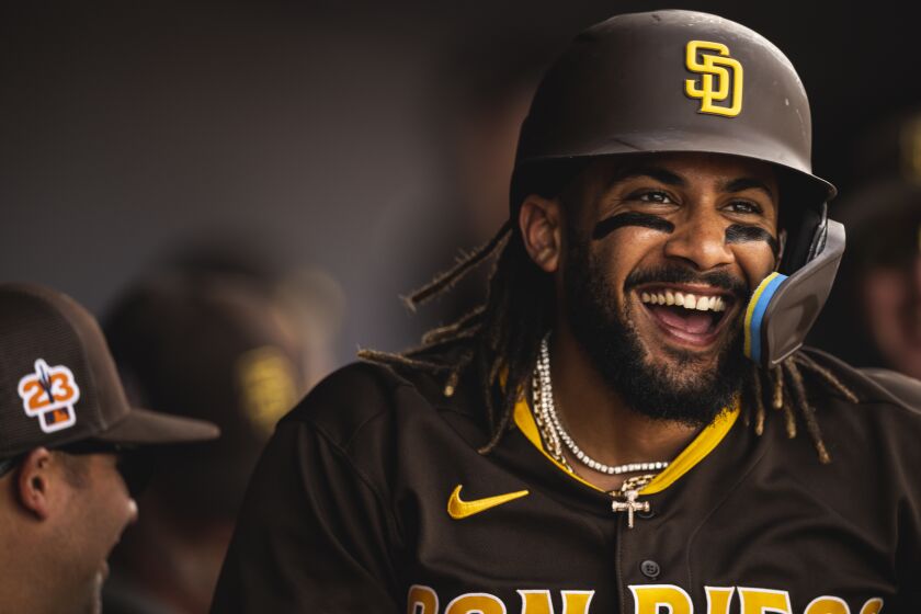 PEORIA, AZ - MARCH 11: Fernando Tatis Jr. #23 of the San Diego Padres celebrates in the dugout after scoring during a spring training game against the Chicago White Sox on March 11, 2023 in Peoria, Arizona. (Photo by Matt Thomas/San Diego Padres/Getty Images)