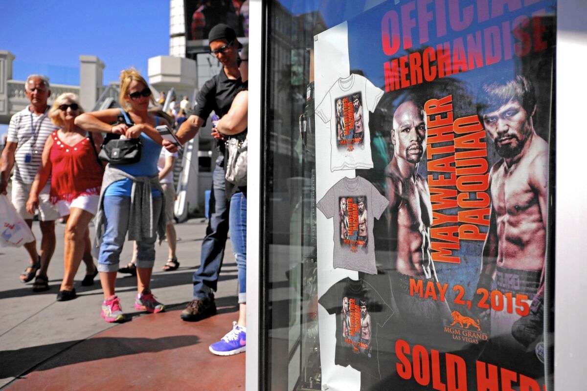 A store on the Las Vegas Strip advertises merchandise for the fight between Floyd Mayweather Jr. and Manny Pacquiao on Saturday at the MGM Grand.