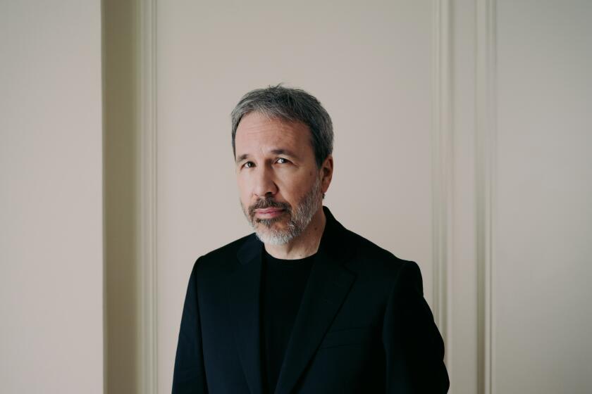 Director Denis Villeneuve in black suit at Le Bristol Hotel in Paris
