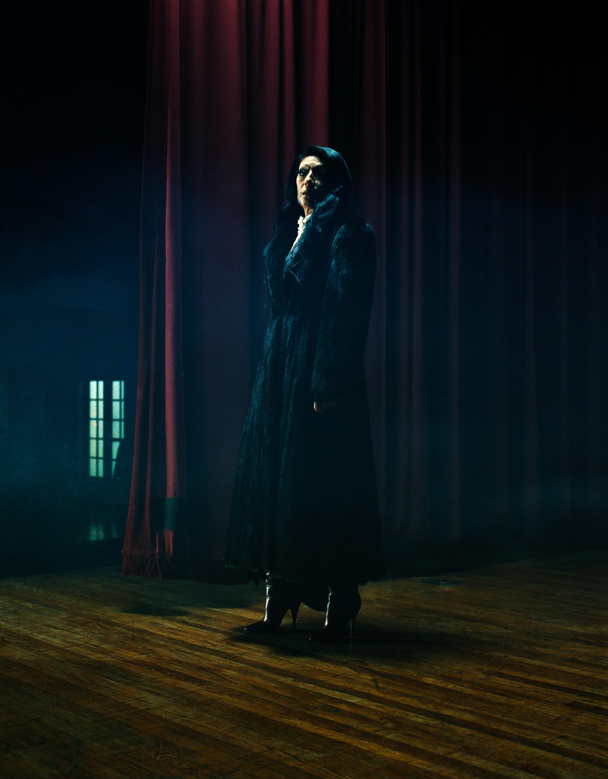 Rosie wears vintage fur coat from the Corner Store, Lanvin blouse, Saint Laurent boots.