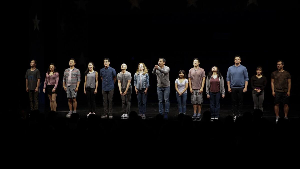 The cast takes a bow after the opening-night performance of "Soft Power."
