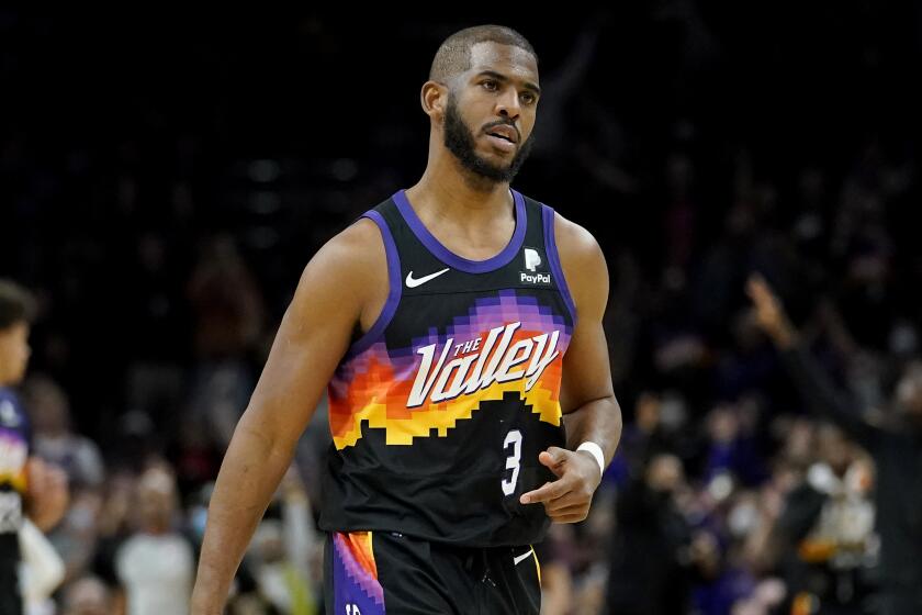 Phoenix Suns guard Chris Paul (3) motions after making a three pointer during the second half.