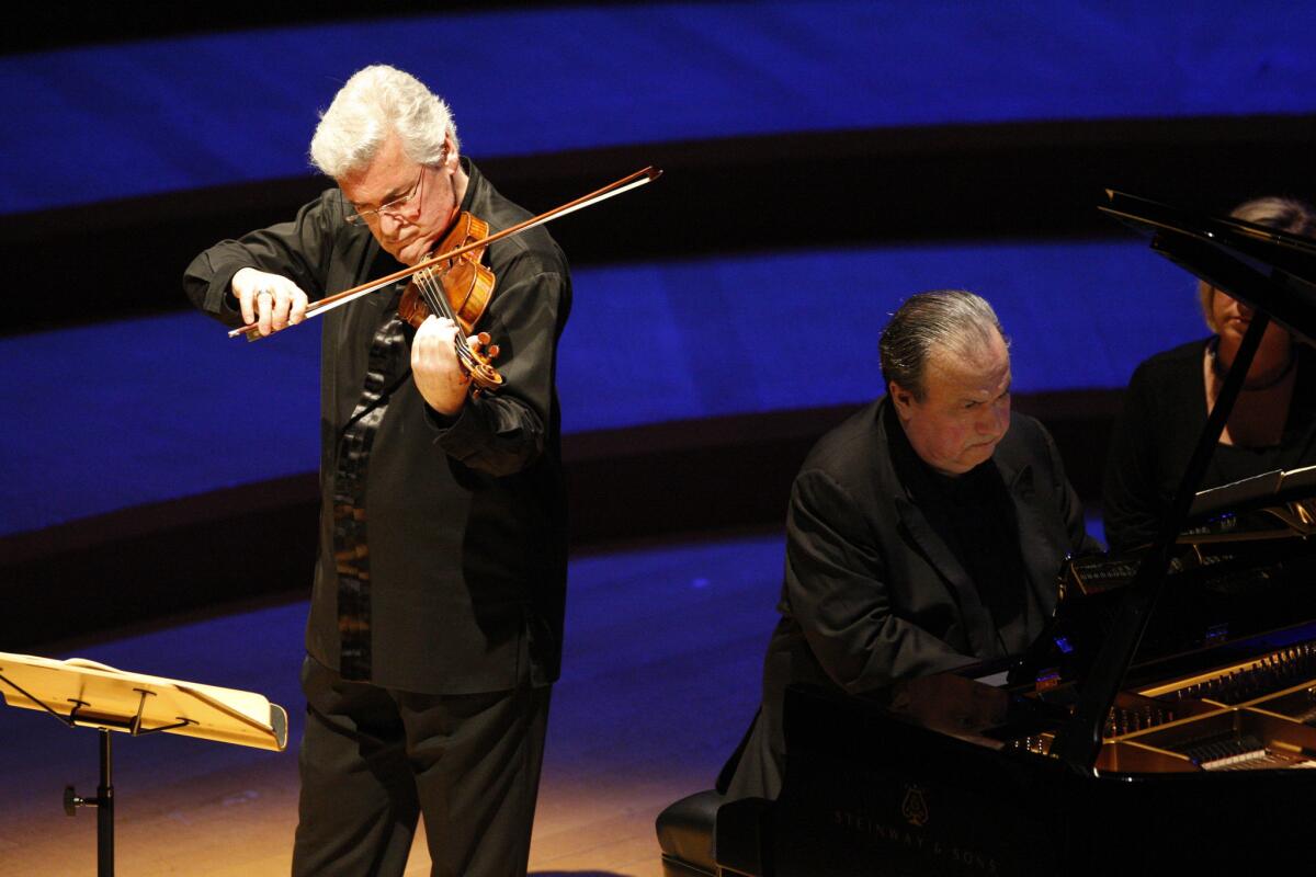 Violinist Pinchas Zukerman and pianist Yefim Bronfman perform at Walt Disney Concert Hall in Los Angeles on April 4, 2014.