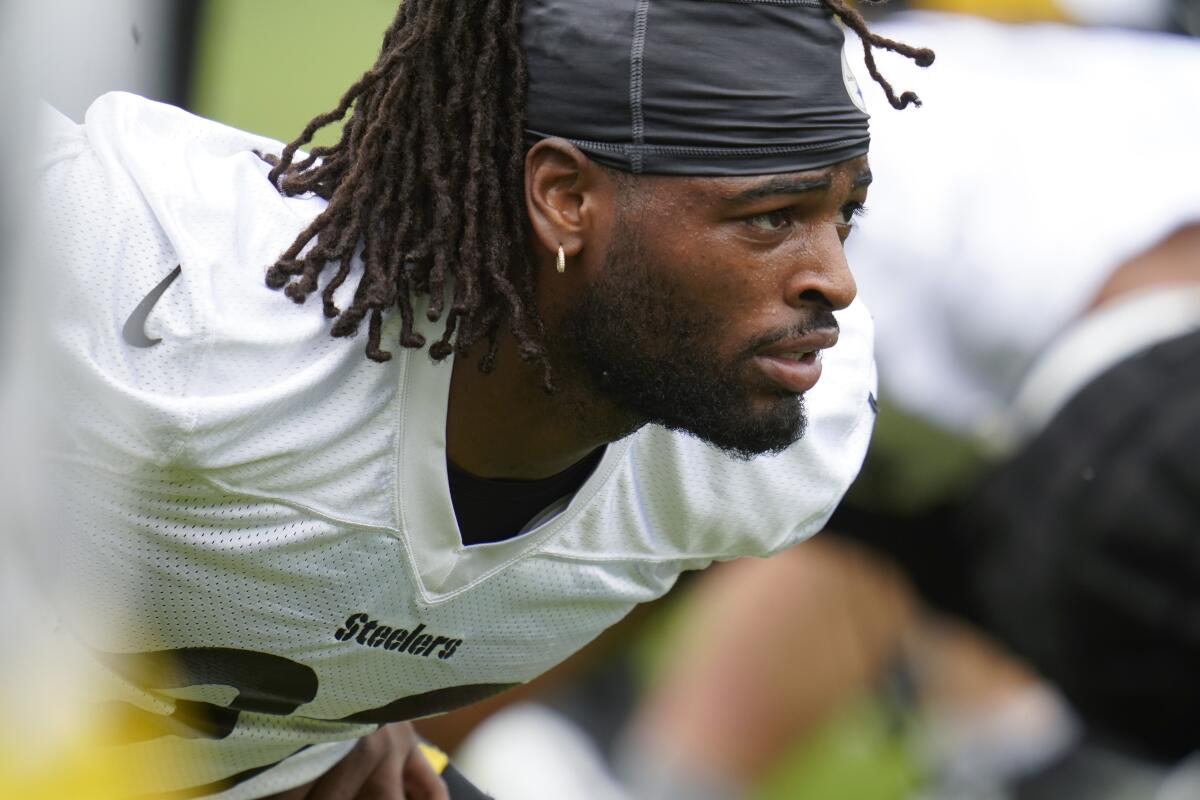Pittsburgh Steelers running back Najee Harris stretches during the NFL football team's training camp in Latrobe, Pa., Wednesday, July 27, 2022. (AP Photo/Keith Srakocic)