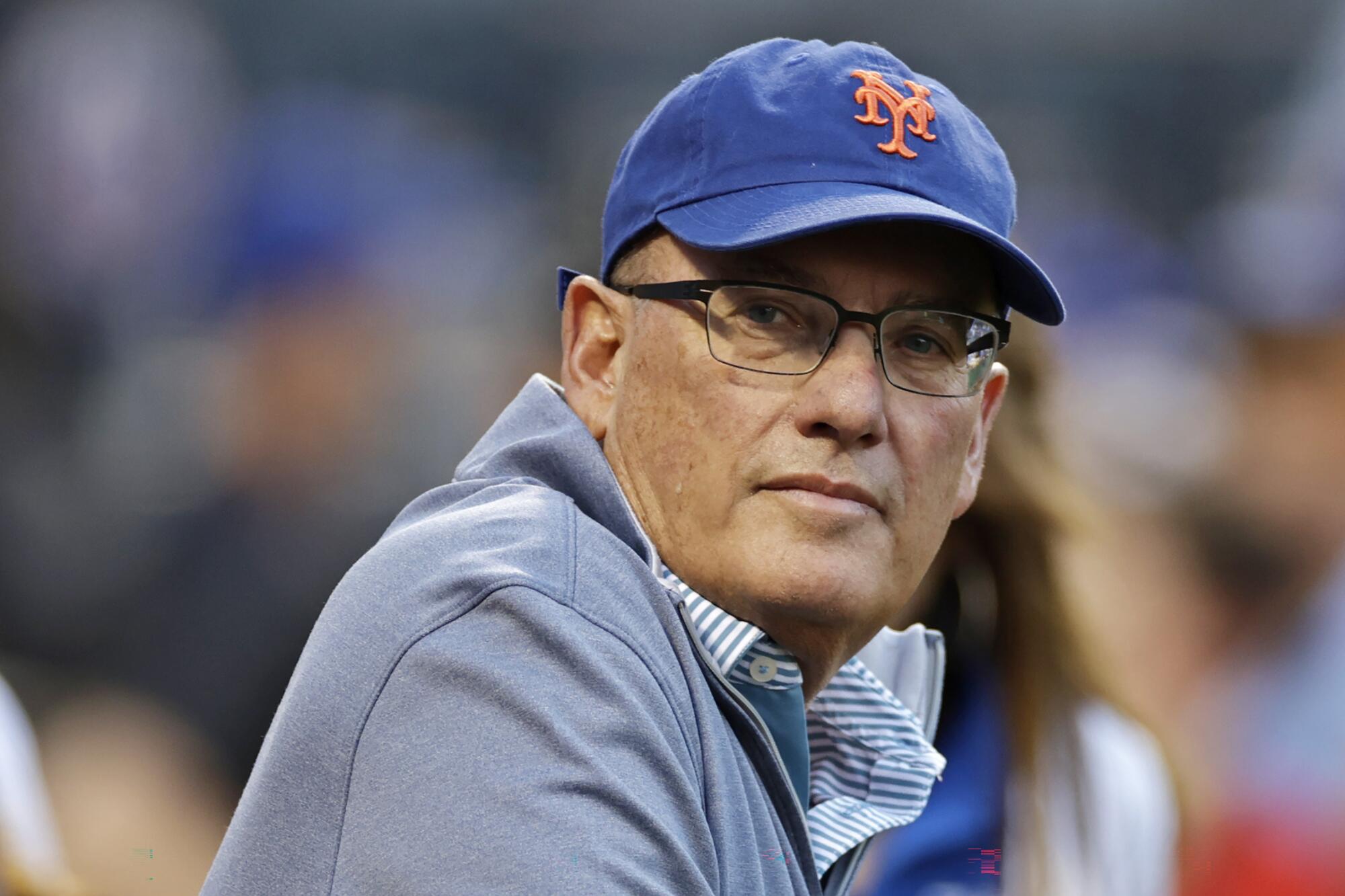 New York Mets owner Steve Cohen waits before a game between the Dodgers and Mets at Citi Field in New York.