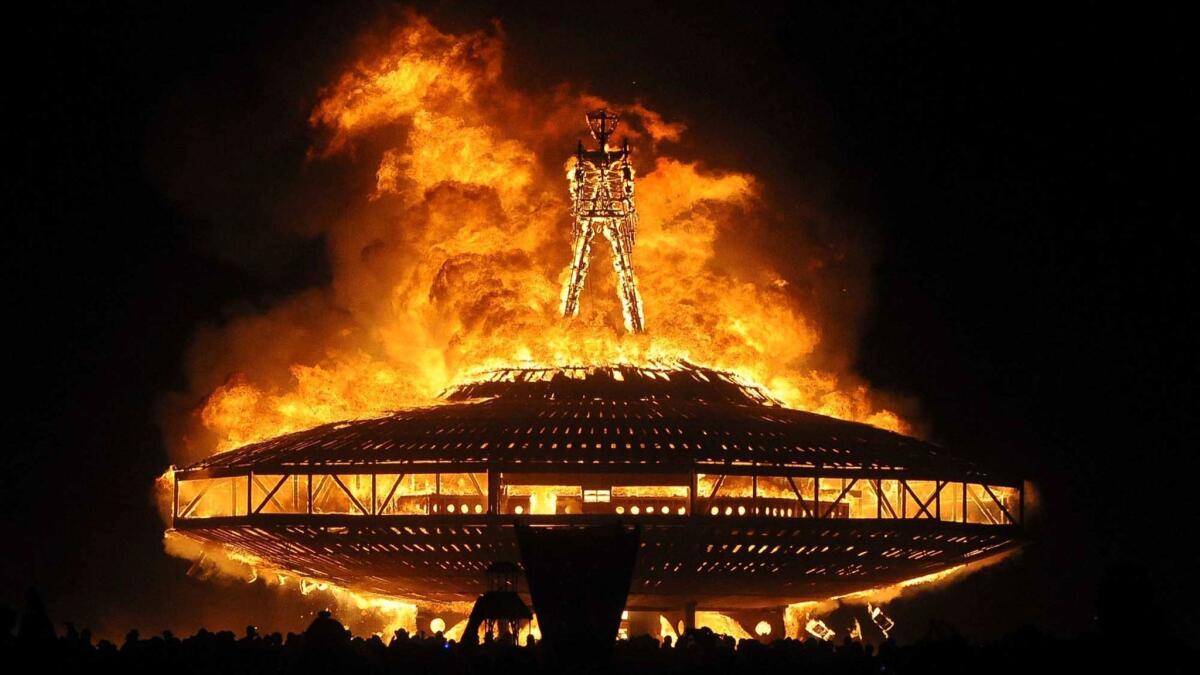 The "Man" burns in the Black Rock Desert at the Burning Man festival near Gerlach, Nev., in 2013.