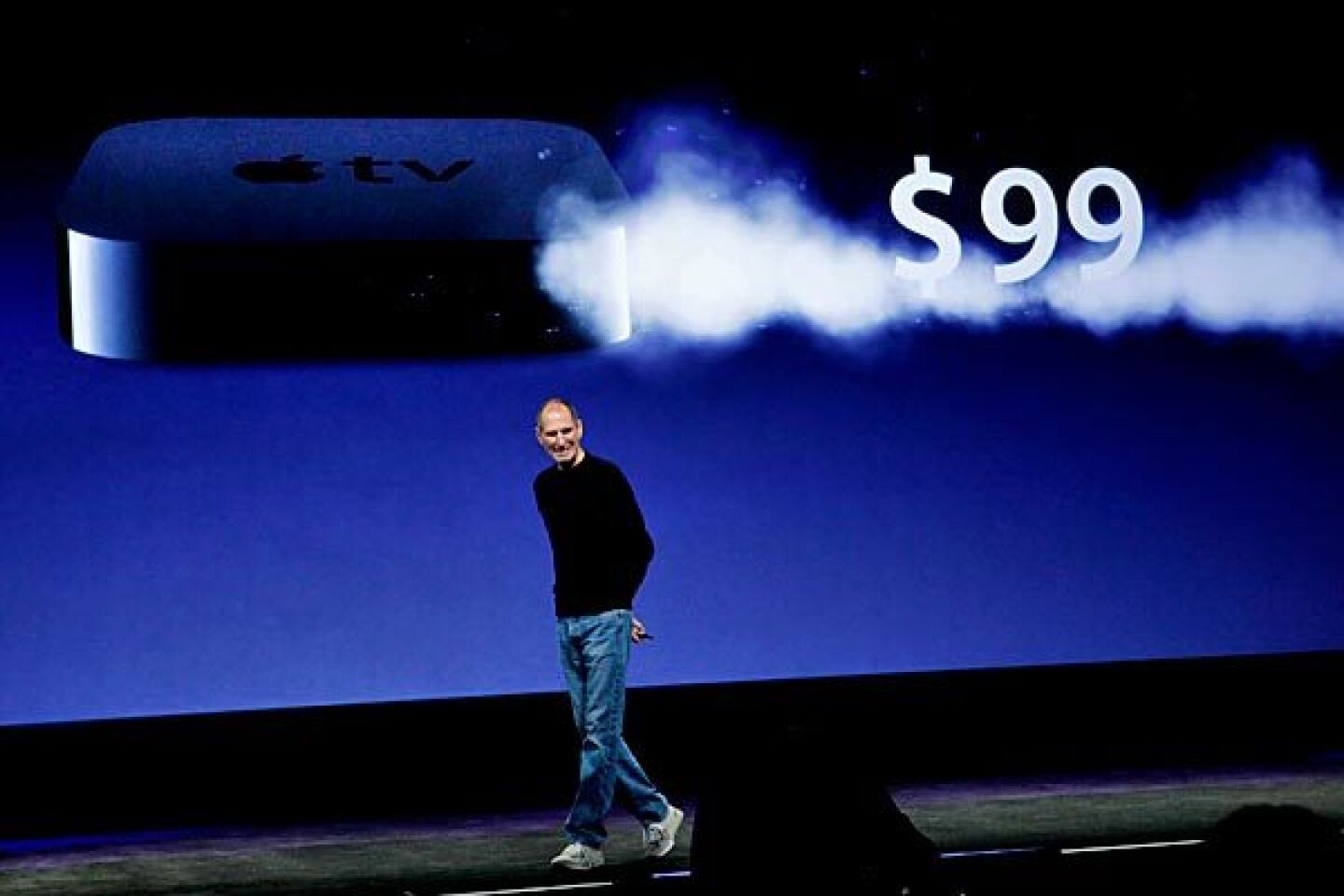 Jobs announces the $99 Apple TV device, with 99-cent online TV show rentals. The majority of Hollywood studios, and two broadcast networks -- CBS and NBC -- declined to allow their shows to be included. "Not all of them wanted to take this step with us," Jobs said. "We think the other studios will see the light."