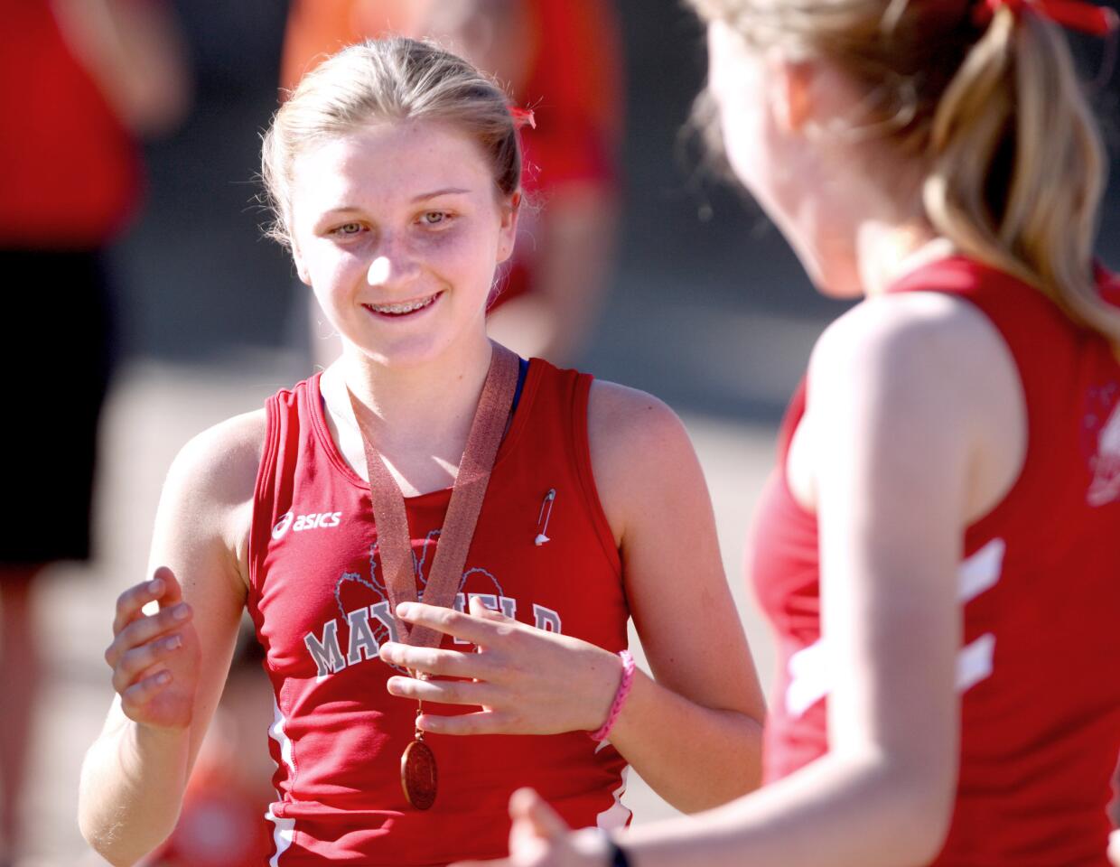 Mayfield High School girls' varsity cross country runner McKenna Smith of La Cañada Flintridge came in third place at the Prep League Cross Country Finals at Pierce College in Woodland Hills on Saturday, Oct. 31, 2015.