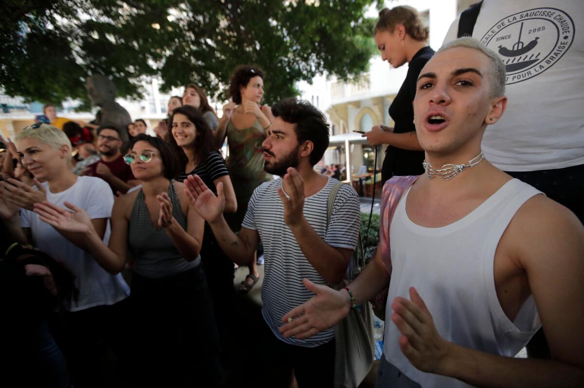 Demonstrators gather in support of Lebanese indie band Mashrou' Leila in Beirut on July 29, 2019.
