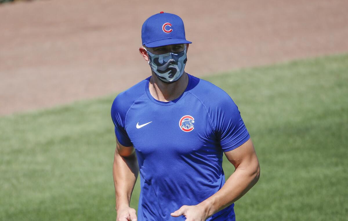 Chicago Cubs third baseman Kris Bryant warms up during baseball practice.