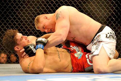 Brock Lesnar takes control of his heavyweight title bout against Frank Mir on Saturday night. The defending champion stopped Mir in the second round.