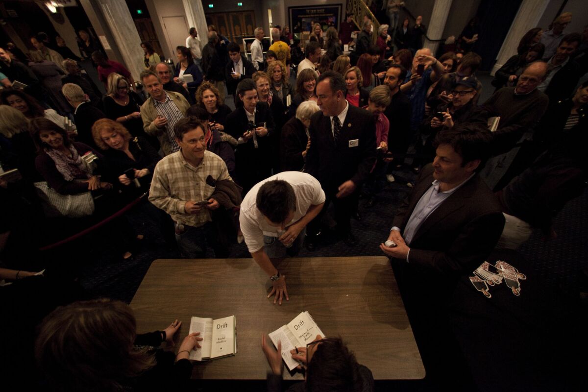 A crowd waits for Rachel Maddow to sign print copies of her book "Drift" at the Saban Theater in April.