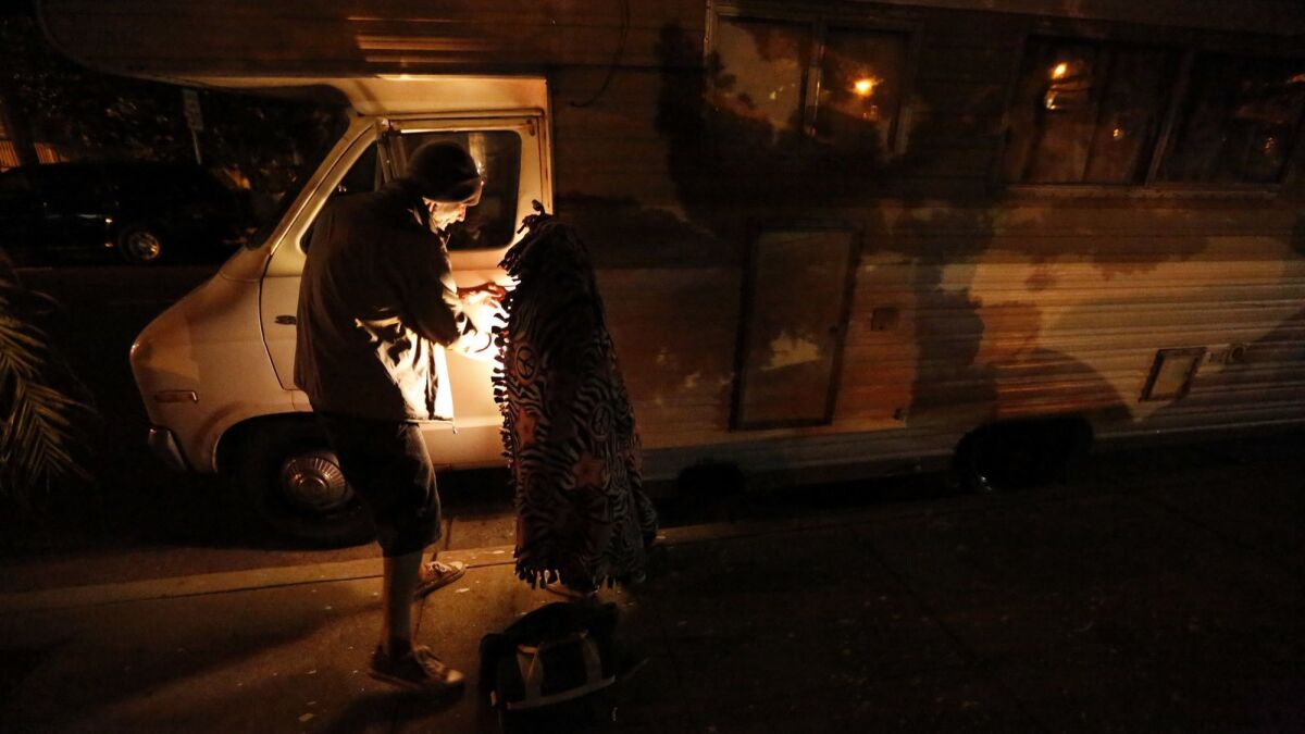 Safe parking programs give those without shelter a spot where they can spend the night in their vehicles. Thomas Goodwin and his daughter Leilani Miranda Duenez Goodwin, above, participate in a program in Santa Barbara.