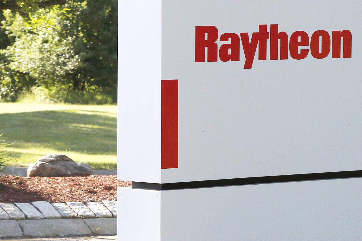 Sign for Raytheon outside company facility in Marlborough, Mass.