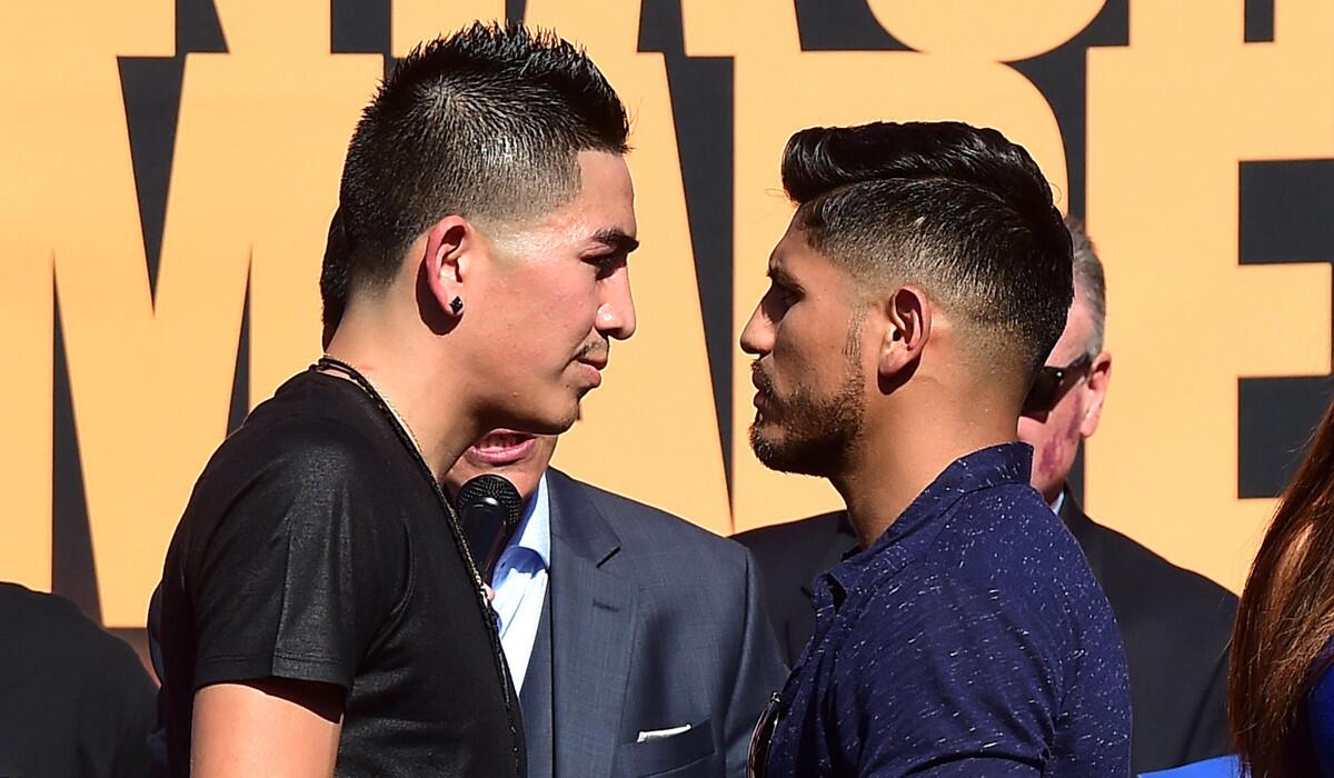Undefeated two-Division World Champion Leo "El Terremoto" Santa Cruz, left, and former three-division world champion Abner Mares face off at a press conference in Los Angeles on July 14.