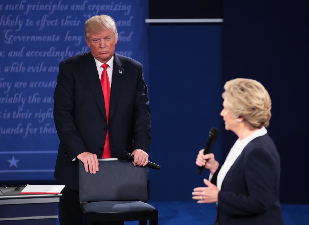 Donald Trump and Hillary Clinton at the second presidential debate in St. Louis, Mo.