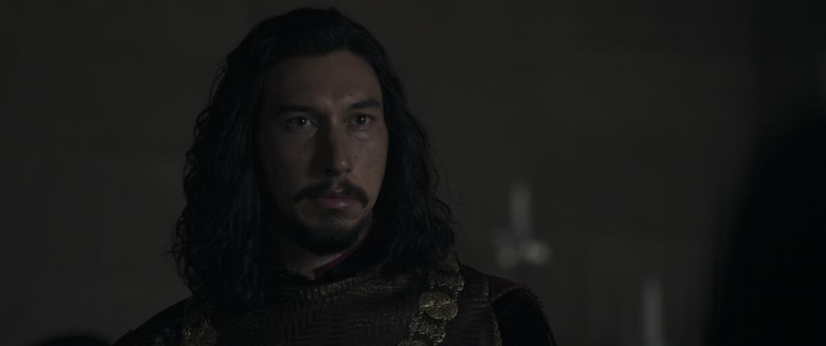 Adam Driver with a mustache and long hair in "The Last Duel."
