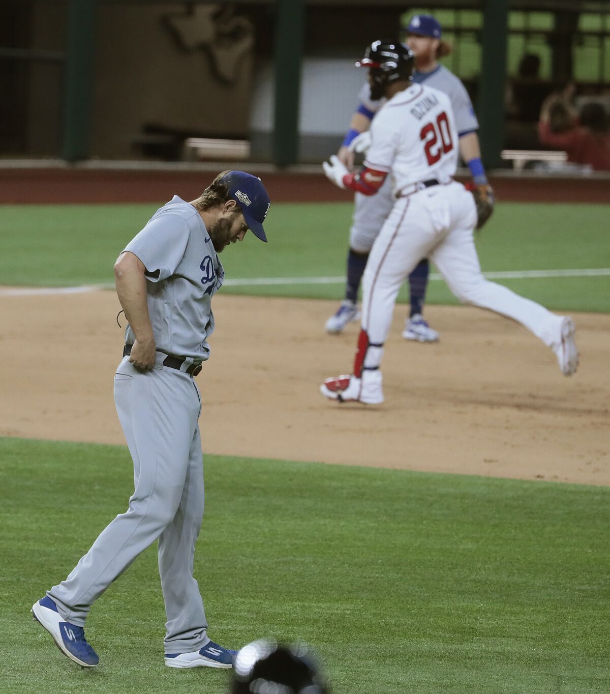Dodgers pitcher Clayton Kershaw reacts after Braves designated hitter Marcell Ozuna hit a home run in Game 4 of the 2020 NLCS
