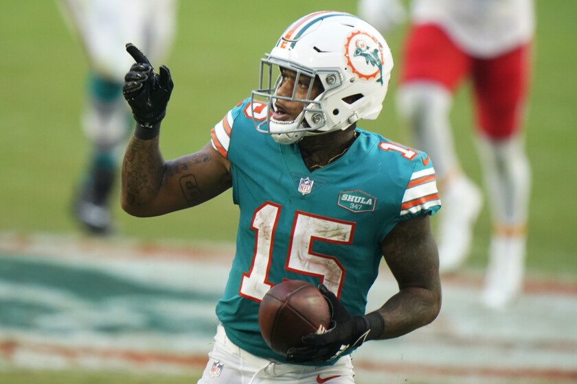 Miami Dolphins running back Lynn Bowden (15) gestures during the second half of an NFL football game against the Kansas City Chiefs, Sunday, Dec. 13, 2020, in Miami Gardens, Fla. Bowden had seven catches for 82 yards, both season highs that led the team. (AP Photo/Wilfredo Lee)