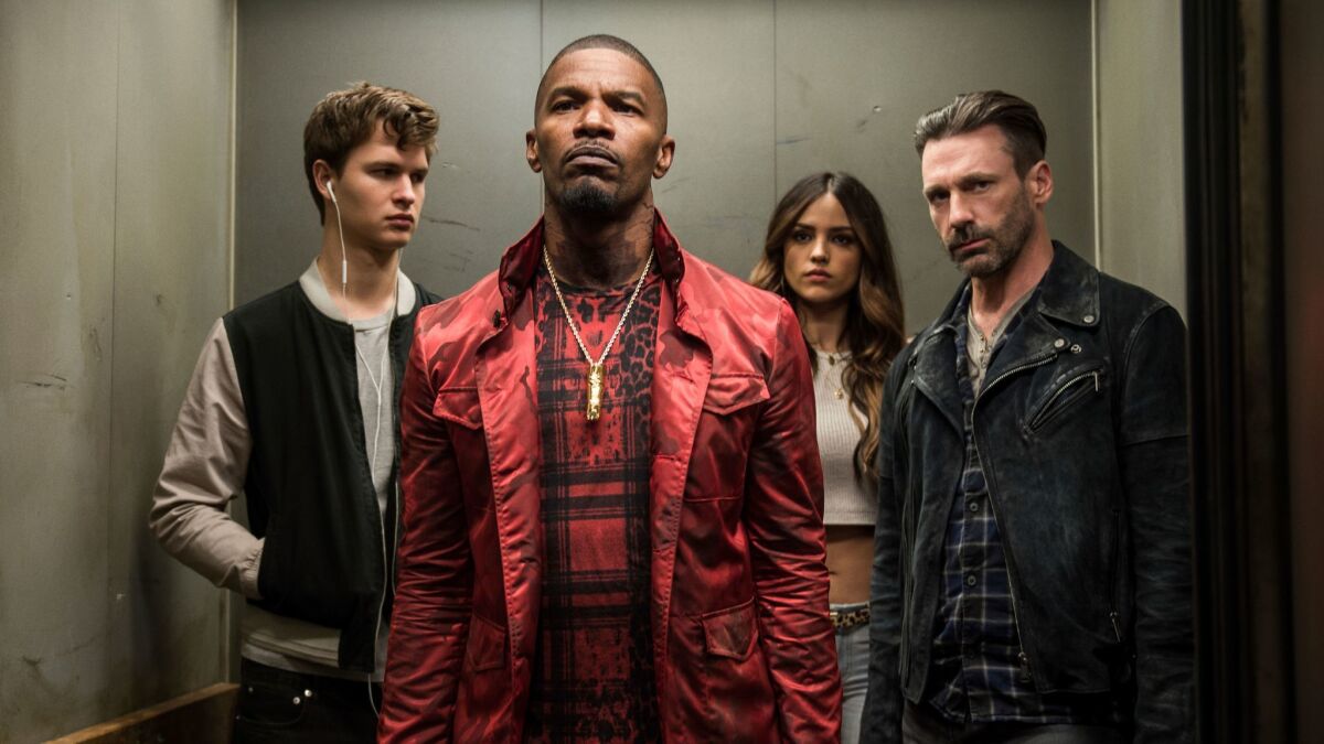 Ansel Elgort, from left, Jamie Foxx, Eiza Gonzalez and Jon Hamm star as colorful criminals in Edgar Wright's action-musical "Baby Driver." (Sony/TriStar)
