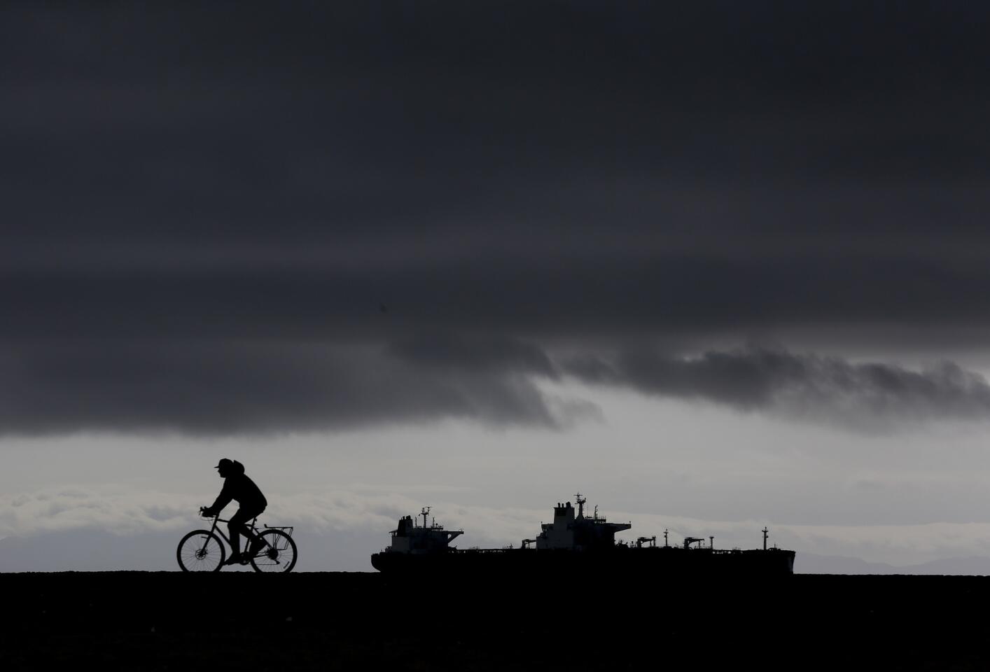 LONG BEACH,CA., FEBRUARY 7, 2017: rides along the boardwalk at Kite Beach in Long Beach after two days of storms brought heavy rains to Southern California.