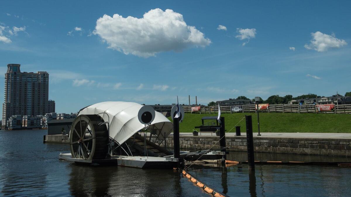 This water wheel, known as Mr. Trash Wheel, in Baltimore’s Inner Harbor is an example of the sort of trash-collecting vessel planned for Upper Newport Bay.