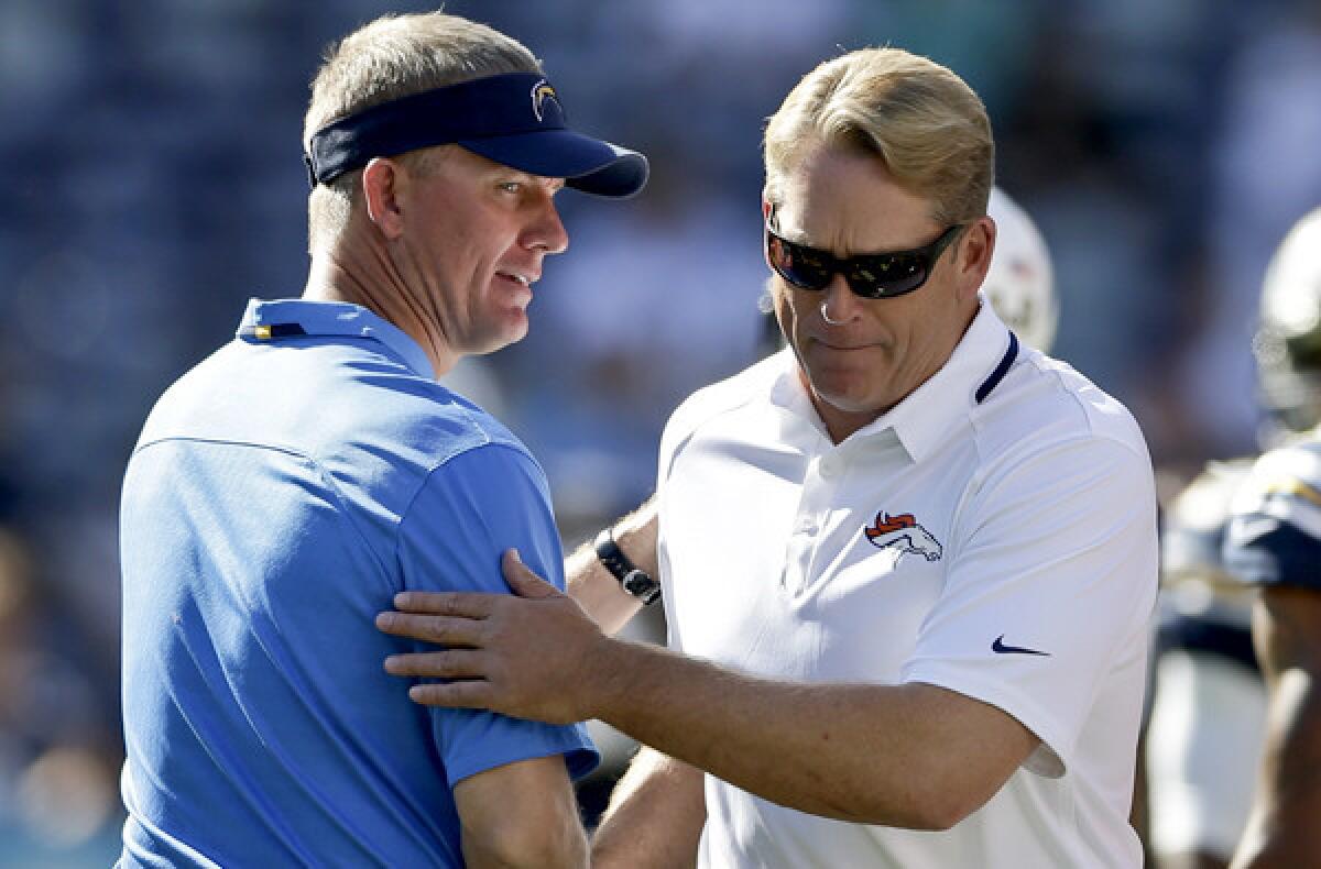 Broncos acting Coach Jack Del Rio, right, shakes hands with Chargers Coach Mike McCoy before their teams played last week.