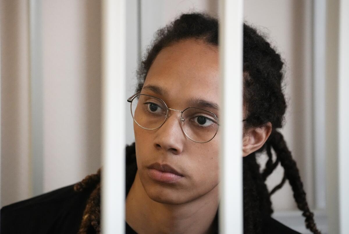 Brittney Griner in a courtroom cage
