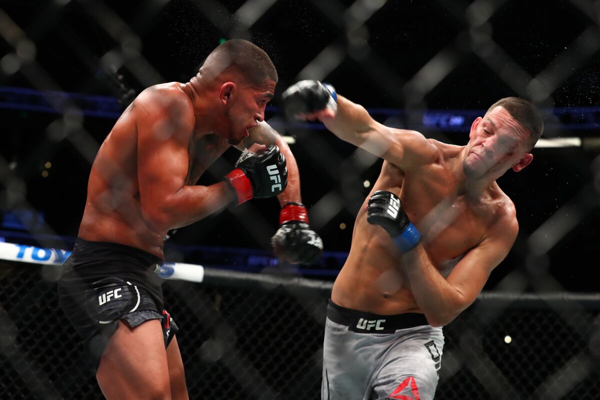 Nate Diaz throws a punch at Anthony Pettis in the second round during their Welterweight Bout at UFC 241 at Honda Center on Saturday.