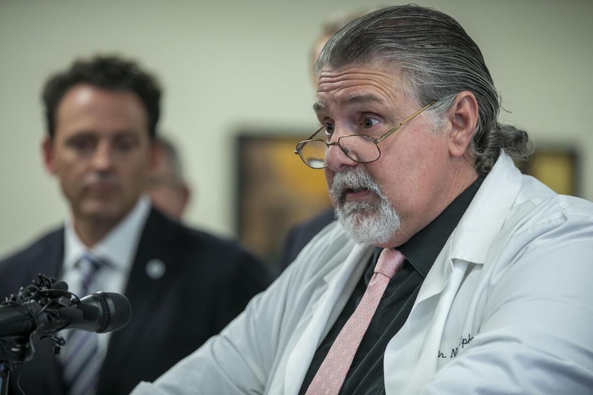 San Diego County Chief Medical Officer Nick Yphantides, standing next to county Supervisor Nathan Fletcher, on March 12, 2020 confirmed during a media conference that community transmission of the COVID-19 virus had occurred in San Diego and gatherings of more than 250 people would not be permitted. That was just the beginning.
