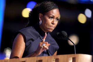 DNC CHICAGO, IL AUGUST 20, 2024 - Former first lady Michelle Obama speaks during the Democratic National Convention Tuesday, Aug. 20, 2024, in Chicago. (Robert Gauthier/Los Angeles Times)