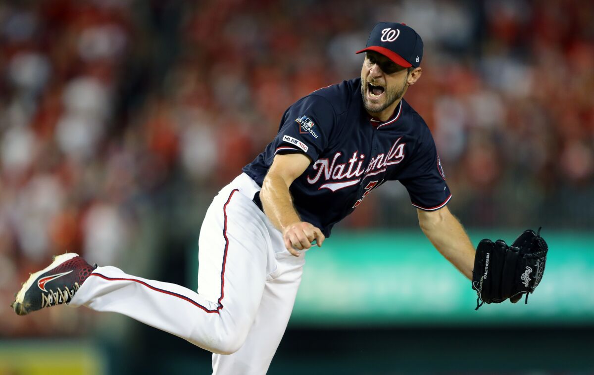Nationals starter Max Scherzer reacts after a strike out during the fourth inning against the Dodgers.