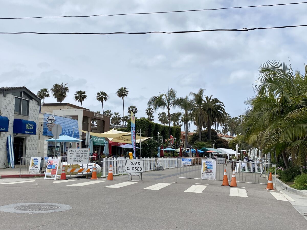 A block of Avenida de la Playa is closed to vehicle traffic to allow restaurants to place tables on the street.