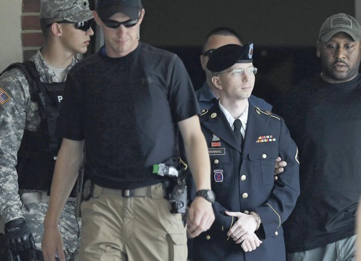 Army Pfc. Bradley Manning leaves the courthouse at Ft. Meade, Md., after the judge rendered her verdict. His sentencing hearing is expected to begin Wednesday.