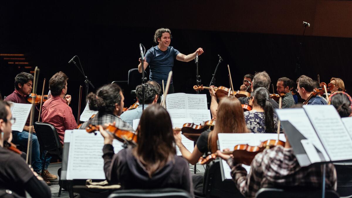 Gustavo Dudamel conducts an orchestra 