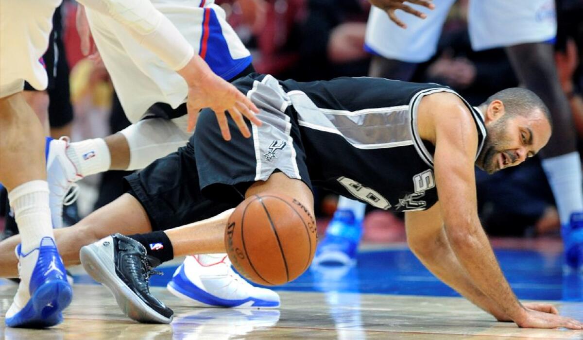 Spurs point guard Tony Parker loses his balance and control of the ball during Game 1.