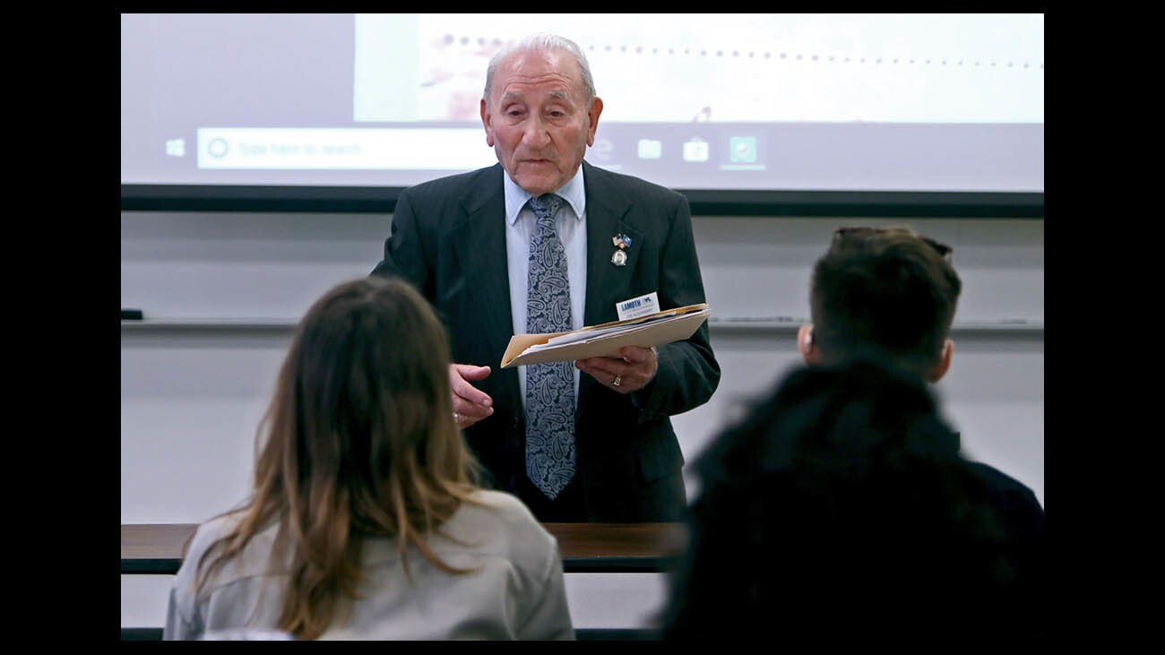 Nazi concentration camp survivor Joseph Alexander, right, spoke to a more-than-full room about his experience in different camps to commemorate Holocaust Remembrance Day at Woodbury University in Burbank on Tuesday, Jan. 29, 2019. His presentation “I Survived 12 Concentration Camps” brought some of those in attendance to tears.