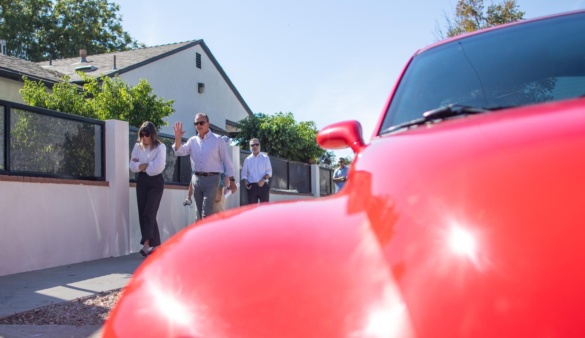 Rick Caruso arrives at a campaign stop in Van Nuys
