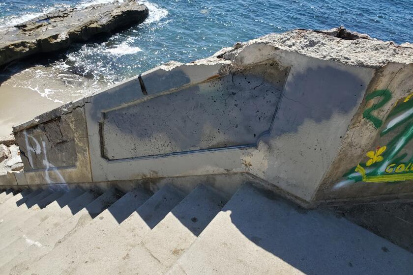 The staircase leading to the beach from Camino de la Costa was partially repainted soon after Nazi symbols were spray painted onto them.