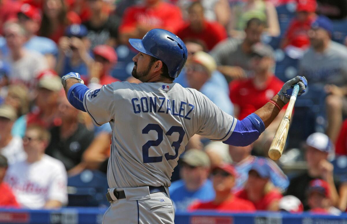 Dodgers first baseman Adrian Gonzalez hits a three-run home run during the second inning of a game against the Philadelphia Phillies on Thursday.