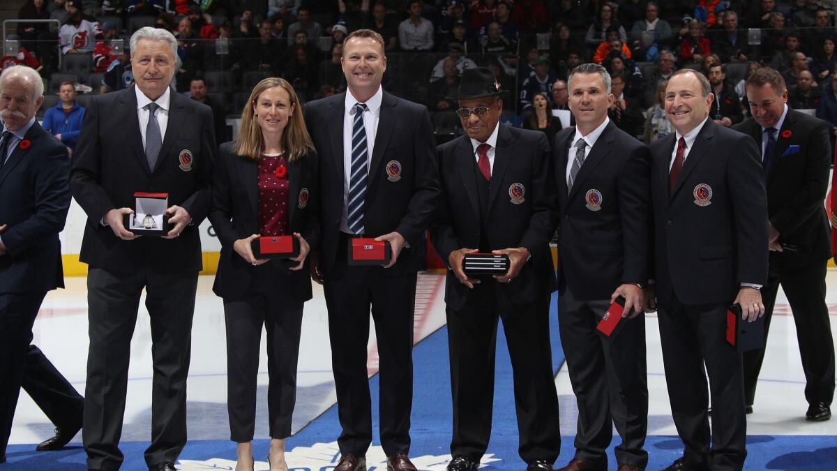 Hall of Fame inductees Aleksander Yakushev, Jayna Hefford, Martin Brodeur, Willie O'Ree, Martin St. Louis and Gary Bettman are introduced prior to the 2018 Hockey Hall of Fame Legends Classic Game at the Air Canada Centre.