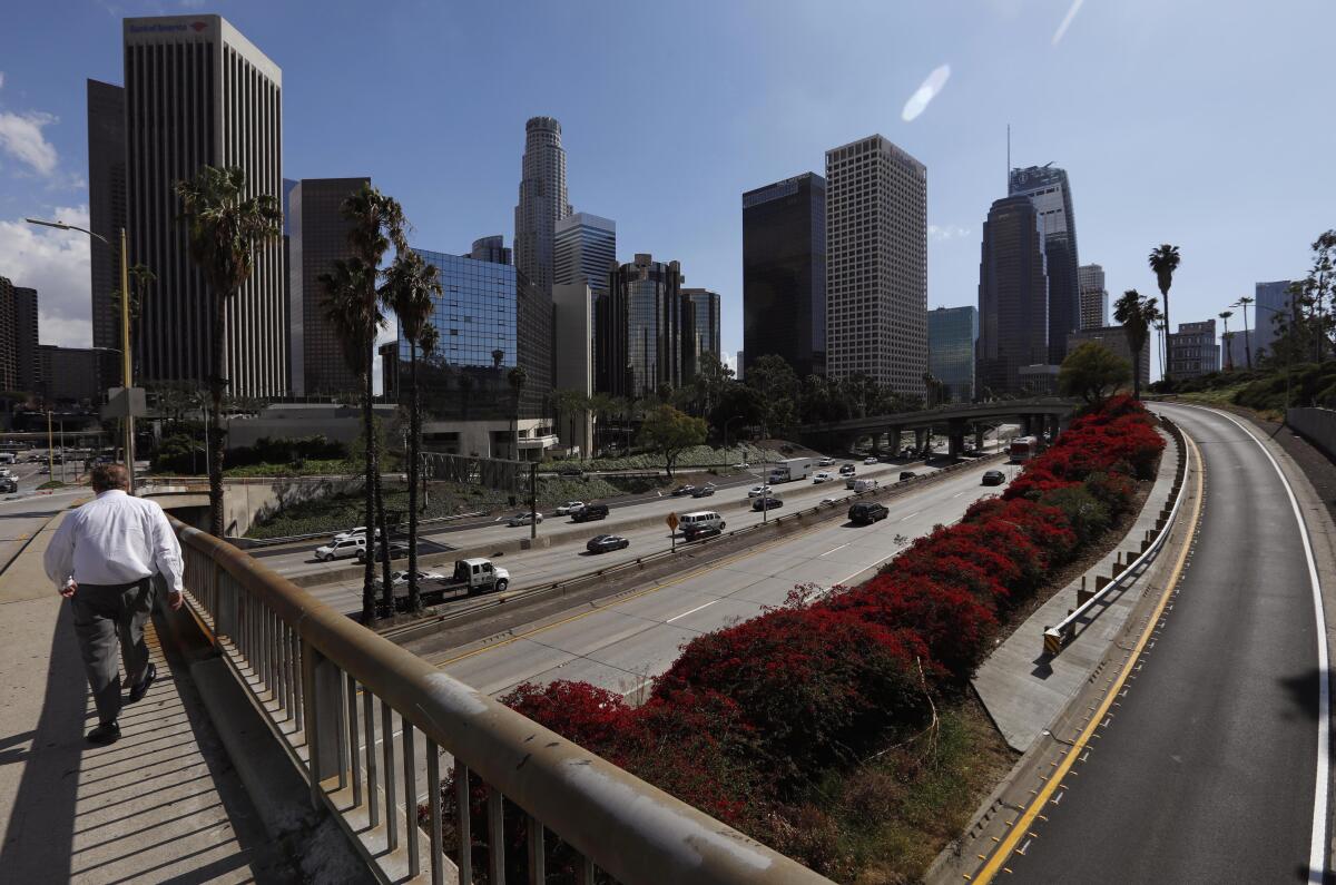 Traffic is light on the 110 Freeway in downtown Los Angeles on March 11